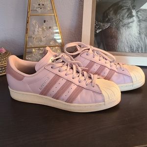 Light purple adidas shell toes